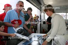 05.05.2006 Nürburg, Germany,  Sebastian Vettel (GER) Signs autographs - Formula 1 World Championship, Rd 5, European Grand Prix, Friday