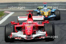 07.05.2006 Nürburg, Germany,  Michael Schumacher (GER), Scuderia Ferrari, F2006 ahead of Fernando Alonso (ESP), Renault F1 Team, in the new R26 - Formula 1 World Championship, Rd 5, European Grand Prix, Sunday Podium