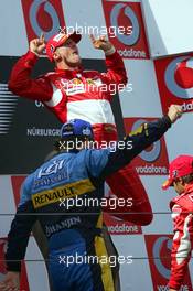07.05.2006 Nürburg, Germany,  Michael Schumacher (GER), Scuderia Ferrari and Fernando Alonso (ESP), Renault F1 Team, in the new R26 - Formula 1 World Championship, Rd 5, European Grand Prix, Sunday Podium