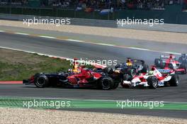 07.05.2006 Nürburg, Germany,  Scott Speed (USA), Scuderia Toro Rosso STR 01, gets collected by other cars when he spins at the first corner - Formula 1 World Championship, Rd 5, European Grand Prix, Sunday Race