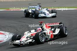 07.05.2006 Nürburg, Germany,  Rubens Barrichello (BRA), Lucky Strike Honda Racing F1 Team RA106, leads Jacques Villeneuve (CAN), BMW Sauber F1 Team F1.06 - Formula 1 World Championship, Rd 5, European Grand Prix, Sunday Race