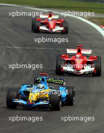 07.05.2006 Nürburg, Germany,  Fernando Alonso (ESP), Renault F1 Team, in the new R26 leads Michael Schumacher (GER), Scuderia Ferrari, F2006 and Felipe Massa (BRA), Scuderia Ferrari - Formula 1 World Championship, Rd 5, European Grand Prix, Sunday Race