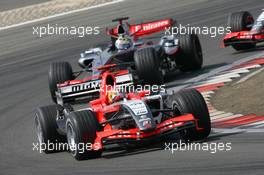 07.05.2006 Nürburg, Germany,  Tiago Monteiro (PRT), Midland MF1 Racing, Toyota M16 and Juan-Pablo Montoya (COL), Juan Pablo, McLaren Mercedes - Formula 1 World Championship, Rd 5, European Grand Prix, Sunday Race