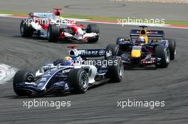 07.05.2006 Nürburg, Germany,  Mark Webber (AUS), WilliamsF1 Team FW28, leads Christian Klien (AUT), Red Bull Racing RB2 and Ralf Schumacher (GER), Panasonic Toyota Racing TF106 - Formula 1 World Championship, Rd 5, European Grand Prix, Sunday Race