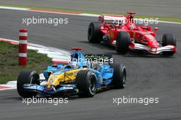 07.05.2006 Nürburg, Germany,  Fernando Alonso (ESP), Mild Seven Renault F1 R26, leads Michael Schumacher (GER), Scuderia Ferrari Marlboro 248 F1 - Formula 1 World Championship, Rd 5, European Grand Prix, Sunday Race