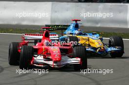 07.05.2006 Nürburg, Germany,  Michael Schumacher (GER), Scuderia Ferrari Marlboro 248 F1, winning in front of Fernando Alonso - Formula 1 World Championship, Rd 5, European Grand Prix, Sunday Race
