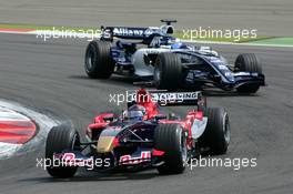 07.05.2006 Nürburg, Germany,  Scott Speed (USA), Scuderia Toro Rosso STR 01, leads Nico Rosberg (GER), WilliamsF1 Team FW28 - Formula 1 World Championship, Rd 5, European Grand Prix, Sunday Race