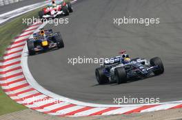 07.05.2006 Nürburg, Germany,  Mark Webber (AUS), Williams F1 Team, FW28 Cosworth leads Christian Klien (AUT), Red Bull Racing, RB2 - Formula 1 World Championship, Rd 5, European Grand Prix, Sunday Race