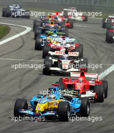 07.05.2006 Nürburg, Germany,  Fernando Alonso (ESP), Renault F1 Team, in the new R26 leads Michael Schumacher (GER), Scuderia Ferrari, F2006 and Jenson Button (GBR), Honda Racing F1 Team- Formula 1 World Championship, Rd 5, European Grand Prix, Sunday Race