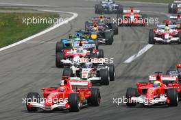 07.05.2006 Nürburg, Germany,  Michael Schumacher (GER), Scuderia Ferrari, 248 F1 and Felipe Massa (BRA), Scuderia Ferrari, 248 F1 at the start of the race - Formula 1 World Championship, Rd 5, European Grand Prix, Sunday Race