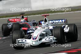 07.05.2006 Nürburg, Germany,  Nico Rosberg (GER), WilliamsF1 Team FW28, leads Juan-Pablo Montoya (COL), McLaren Mercedes MP4-21 - Formula 1 World Championship, Rd 5, European Grand Prix, Sunday Race