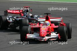 07.05.2006 Nürburg, Germany,  Felipe Massa (BRA), Scuderia Ferrari Marlboro 248 F1, leads Kimi Raikkonen (FIN), West McLaren Mercedes MP4-20, for third place - Formula 1 World Championship, Rd 5, European Grand Prix, Sunday Race
