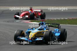 07.05.2006 Nürburg, Germany,  Fernando Alonso (ESP), Mild Seven Renault F1 R26, leads Felipe Massa (BRA), Scuderia Ferrari Marlboro 248 F1 - Formula 1 World Championship, Rd 5, European Grand Prix, Sunday Race