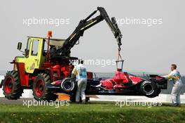 07.05.2006 Nürburg, Germany,  Marshalls move the car of Scott Speed (USA), Scuderia Toro Rosso STR 01 - Formula 1 World Championship, Rd 5, European Grand Prix, Sunday Race