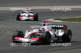 07.05.2006 Nürburg, Germany,  Takuma Sato (JPN), Super Aguri F1 SA05, leads Franck Montagny (FRA), Super Aguri F1 SA05 - Formula 1 World Championship, Rd 5, European Grand Prix, Sunday Race