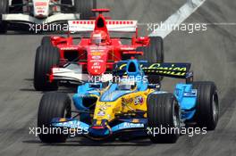 07.05.2006 Nürburg, Germany,  Fernando Alonso (ESP), Renault F1 Team, in the new R26 leads Michael Schumacher (GER), Scuderia Ferrari, F2006 - Formula 1 World Championship, Rd 5, European Grand Prix, Sunday Race
