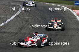 07.05.2006 Nürburg, Germany,  Jarno Trulli (ITA), Toyota Racing, TF106 leads Rubens Barrichello (BRA), Honda Racing F1 Team, RA106  - Formula 1 World Championship, Rd 5, European Grand Prix, Sunday Race