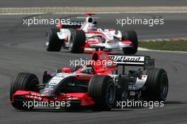 07.05.2006 Nürburg, Germany,  Christian Abt (GER), Audi Sport Team Phoenix, Audi A4 DTM, leads Takuma Sato (JPN), Super Aguri F1 SA05 - Formula 1 World Championship, Rd 5, European Grand Prix, Sunday Race