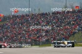 07.05.2006 Nürburg, Germany,  Fernando Alonso (ESP), Renault F1 Team, R26 leads Michael Schumacher (GER), Scuderia Ferrari, 248 F1 - Formula 1 World Championship, Rd 5, European Grand Prix, Sunday Race