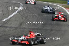 07.05.2006 Nürburg, Germany,  Tiago Monteiro (PRT), Midland MF1 Racing, Toyota M16 leads Christijan Albers (NED), Midland MF1 Racing, Toyota M16 - Formula 1 World Championship, Rd 5, European Grand Prix, Sunday Race