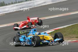 07.05.2006 Nürburg, Germany,  Fernando Alonso (ESP), Renault F1 Team, R26 leads Michael Schumacher (GER), Scuderia Ferrari, 248 F1 - Formula 1 World Championship, Rd 5, European Grand Prix, Sunday Race