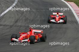 07.05.2006 Nürburg, Germany,  Michael Schumacher (GER), Scuderia Ferrari, 248 F1 and Felipe Massa (BRA), Scuderia Ferrari, 248 F1 - Formula 1 World Championship, Rd 5, European Grand Prix, Sunday Race