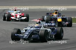 07.05.2006 Nürburg, Germany,  Mark Webber (AUS), WilliamsF1 Team FW28, leads Christian Klien (AUT), Red Bull Racing RB2 and Ralf Schumacher (GER), Panasonic Toyota Racing TF106 - Formula 1 World Championship, Rd 5, European Grand Prix, Sunday Race