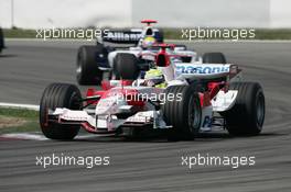 06.05.2006 Nürburg, Germany,  Ralf Schumacher (GER), Toyota Racing, TF106 leads Mark Webber (AUS), Williams F1 Team, FW28 Cosworth - Formula 1 World Championship, Rd 5, European Grand Prix, Saturday Qualifying