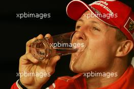 04.05.2006 Nürburg, Germany,  Michael Schumacher (GER), Scuderia Ferrari drinks a glass of water - Formula 1 World Championship, Rd 5, European Grand Prix, Thursday