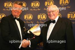 08.12.2006 Monte Carlo, Monaco,  Professor Sid Watkins (GBR), presents the FIA InstituteCentre of Excellence trophy to Philippe Gurdjian - 2006 FIA Gala Prize Giving Ceremony