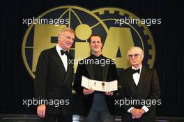 08.12.2006 Monte Carlo, Monaco,  Max Mosley (GBR) FIA President and Bernie Ecclestone (GBR) FOM President, present Michael Schumacher (GER) with the FIA Academy Gold Medal - 2006 FIA Gala Prize Giving Ceremony