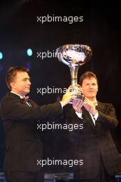 08.12.2006 Monte Carlo, Monaco,  Jost Capito (GER) Director, BP Ford WRC Team, and Malcolm Wilson, Team Manger, BP Ford WRC Team, collect their World Rally Championship Constructors Trophy - 2006 FIA Gala Prize Giving Ceremony
