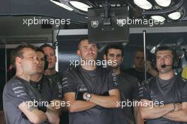 14.07.2006 Magny Cours, France,  McLaren Mercedes Mechanics and Engineers watch the free practice session on the monitors - Formula 1 World Championship, Rd 11, French Grand Prix, Friday Practice