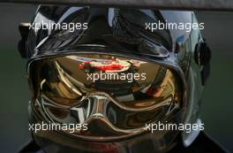 14.07.2006 Magny Cours, France,  Jarno Trulli (ITA), Toyota Racing, TF106, Reflection in a Fire Marshalls helmet - Formula 1 World Championship, Rd 11, French Grand Prix, Friday Practice