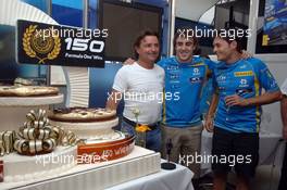 14.07.2006 Magny Cours, France,  Elf celebrate 150 Grand prix wins, Fernando Alonso (ESP), Renault F1 Team and Giancarlo Fisichella (ITA), Renault F1 Team  - Formula 1 World Championship, Rd 11, French Grand Prix, Friday