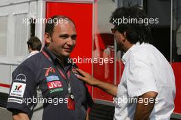 14.07.2006 Magny Cours, France,  Colin Kolles (GER), Midland MF1 Racing, Managing Director,with Pasquale Lattuneddu (ITA), Chief Operations FOM - Formula 1 World Championship, Rd 11, French Grand Prix, Friday