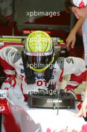 14.07.2006 Magny Cours, France,  Ralf Schumacher (GER), Toyota Racing TF106, getting in his car - Formula 1 World Championship, Rd 11, French Grand Prix, Friday Practice