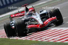 14.07.2006 Magny Cours, France,  Kimi Raikkonen (FIN), Team West McLaren Mercedes MP4-21 - Formula 1 World Championship, Rd 11, French Grand Prix, Friday Practice