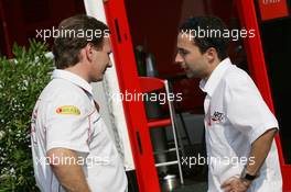 14.07.2006 Magny Cours, France,  Christian Horner (GBR), Red Bull Racing, Sporting Director, talks with, Nicolas Todt, Son of Jean Todt (FRA), Scuderia Ferrari, Teamchief, General Manager, Team Principal and is the Manager of Felipe Massa (BRA), Scuderia Ferrari - Formula 1 World Championship, Rd 11, French Grand Prix, Friday