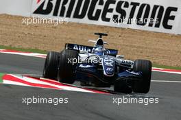 14.07.2006 Magny Cours, France,  Nico Rosberg (GER), WilliamsF1 Team FW28, jumping over the kurbstones - Formula 1 World Championship, Rd 11, French Grand Prix, Friday Practice