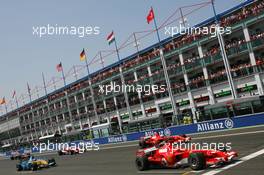 16.07.2006 Magny Cours, France,  Michael Schumacher (GER), Scuderia Ferrari, 248 F1, Felipe Massa (BRA), Scuderia Ferrari, 248 F1, Fernando Alonso (ESP), Renault F1 Team, R26 - Formula 1 World Championship, Rd 11, French Grand Prix, Sunday Pre-Race Grid