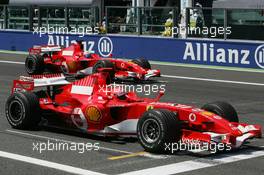 16.07.2006 Magny Cours, France,  Michael Schumacher (GER), Scuderia Ferrari and Felipe Massa (BRA), Scuderia Ferrari - Formula 1 World Championship, Rd 11, French Grand Prix, Sunday Pre-Race Grid