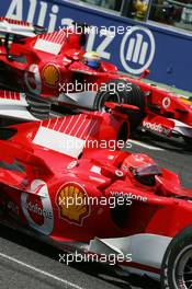 16.07.2006 Magny Cours, France,  Michael Schumacher (GER), Scuderia Ferrari amd Felipe Massa (BRA), Scuderia Ferrari - Formula 1 World Championship, Rd 11, French Grand Prix, Sunday Pre-Race Grid