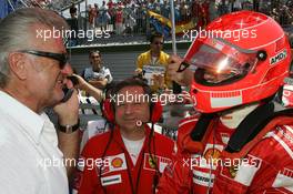 16.07.2006 Magny Cours, France,  Willi Weber (GER), Driver Manager with Michael Schumacher (GER), Scuderia Ferrari and Jean Todt (FRA), Scuderia Ferrari, Teamchief, General Manager, Team Principal  - Formula 1 World Championship, Rd 11, French Grand Prix, Sunday Pre-Race Grid