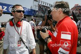 16.07.2006 Magny Cours, France,  Jean Todt (FRA), Scuderia Ferrari, Teamchief, General Manager, Team Principal with his son Nicolas Todt (FRA) amanger of Felipe Massa (BRA), Scuderia Ferrari - Formula 1 World Championship, Rd 11, French Grand Prix, Sunday Pre-Race Grid