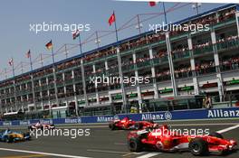 16.07.2006 Magny Cours, France,  Michael Schumacher (GER), Scuderia Ferrari, 248 F1, Felipe Massa (BRA), Scuderia Ferrari, 248 F1, Fernando Alonso (ESP), Renault F1 Team, R26 - Formula 1 World Championship, Rd 11, French Grand Prix, Sunday Pre-Race Grid