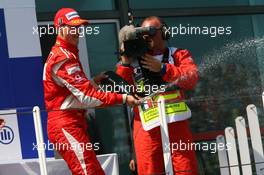 16.07.2006 Magny Cours, France,  1st place, Michael Schumacher (GER), Scuderia Ferrari - Formula 1 World Championship, Rd 11, French Grand Prix, Sunday Podium