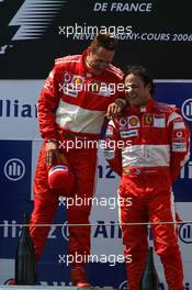 16.07.2006 Magny Cours, France,  1st place Michael Schumacher (GER), Scuderia Ferrari and 3rd place Felipe Massa (BRA), Scuderia Ferrari - Formula 1 World Championship, Rd 11, French Grand Prix, Sunday Podium