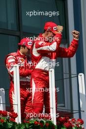 16.07.2006 Magny Cours, France,  Michael Schumacher (GER), Scuderia Ferrari, Portrait (1st) and Felipe Massa (BRA), Scuderia Ferrari, Portrait (3rd) - Formula 1 World Championship, Rd 11, French Grand Prix, Sunday Podium