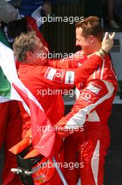 16.07.2006 Magny Cours, France,  Jean Todt (FRA), Scuderia Ferrari, Teamchief, General Manager, Team Principal and Michael Schumacher (GER), Scuderia Ferrari - Formula 1 World Championship, Rd 11, French Grand Prix, Sunday Podium